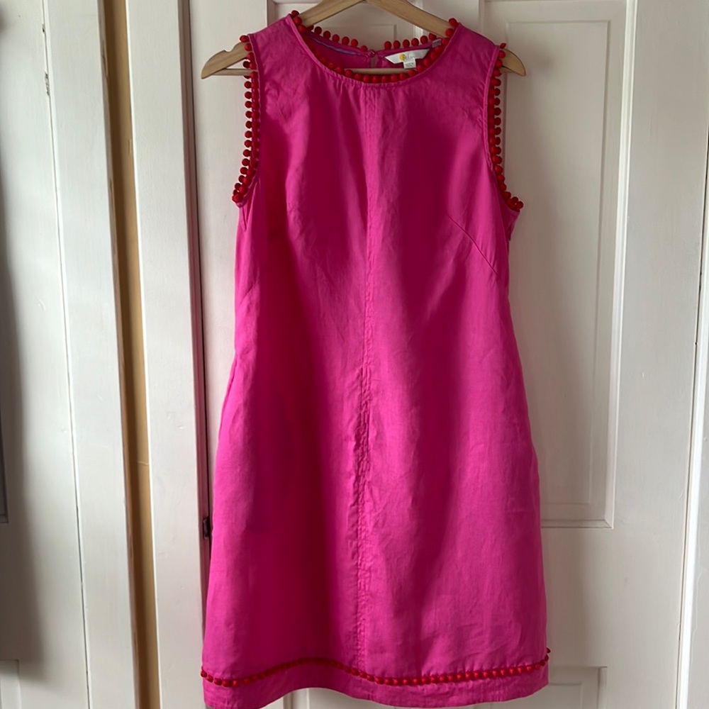 Pink Boden 100% linen shift with red bobble trim.